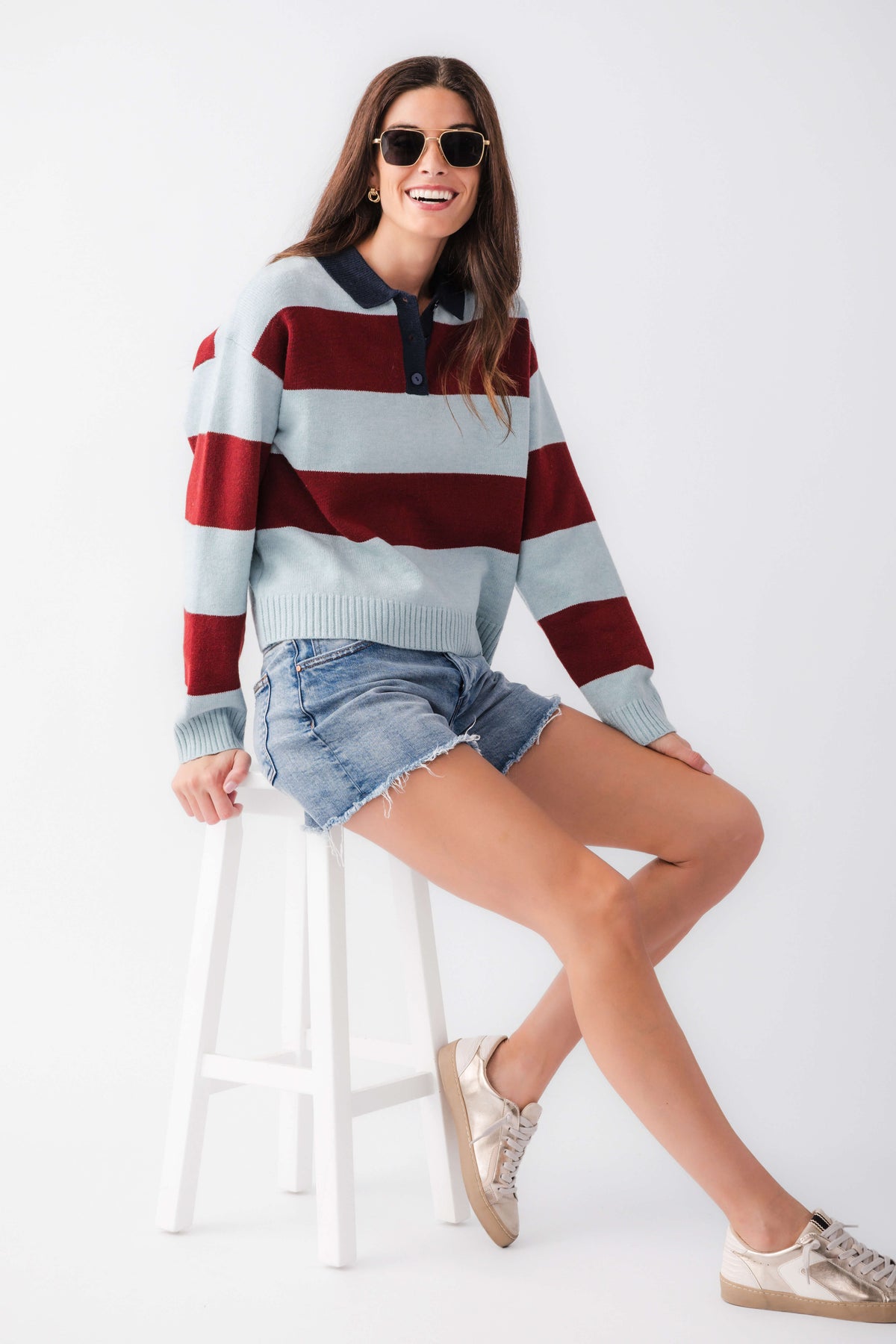 Sky blue and maroon striped collared rugby sweater with button front and ribbed cuffs