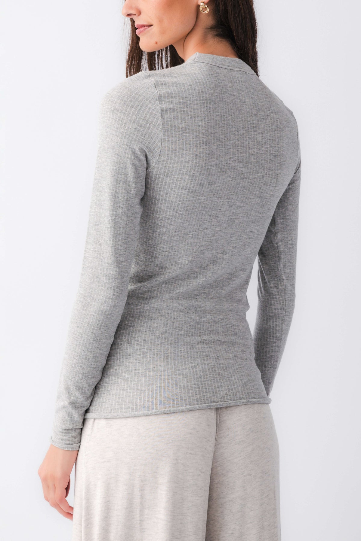 Heather grey seamless long sleeve top, crew neck back view, fitted silhouette