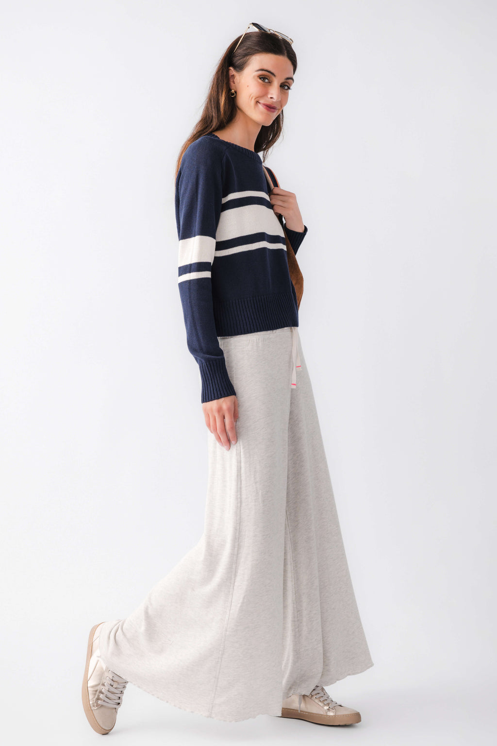 Heather grey wide-leg pants with elastic waistband and drawstring; angled side view
