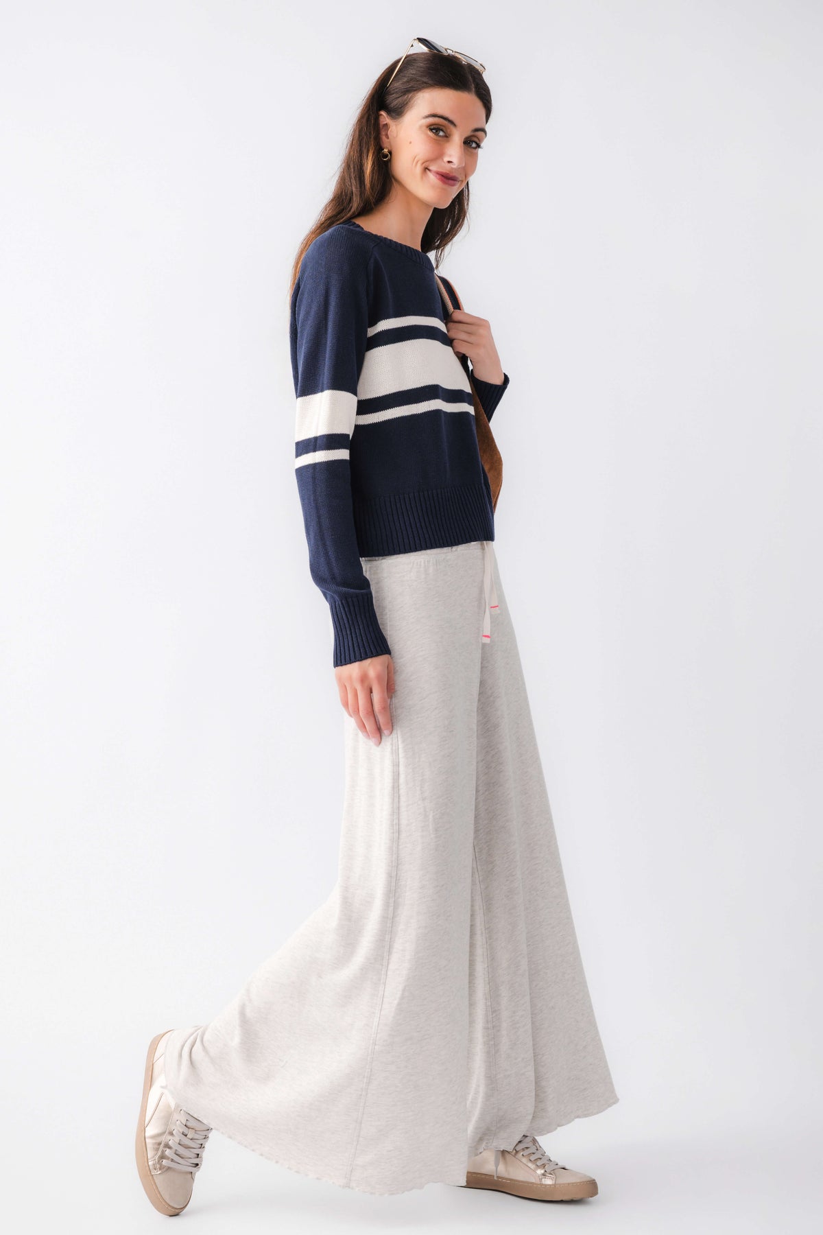 Heather grey wide-leg pants with elastic waistband and drawstring; angled side view