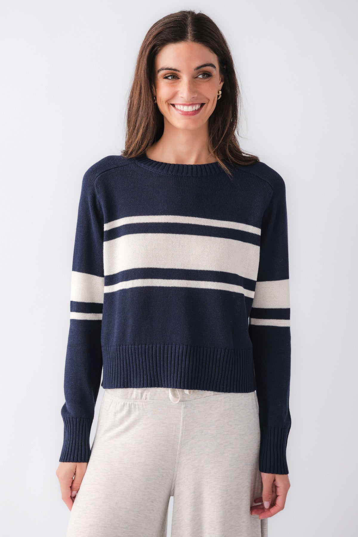 Navy crewneck striped sweater with cream bands, long sleeves