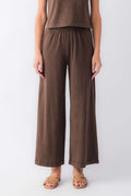 Dark brown jersey crop flare pants with elastic waistband, wide straight legs