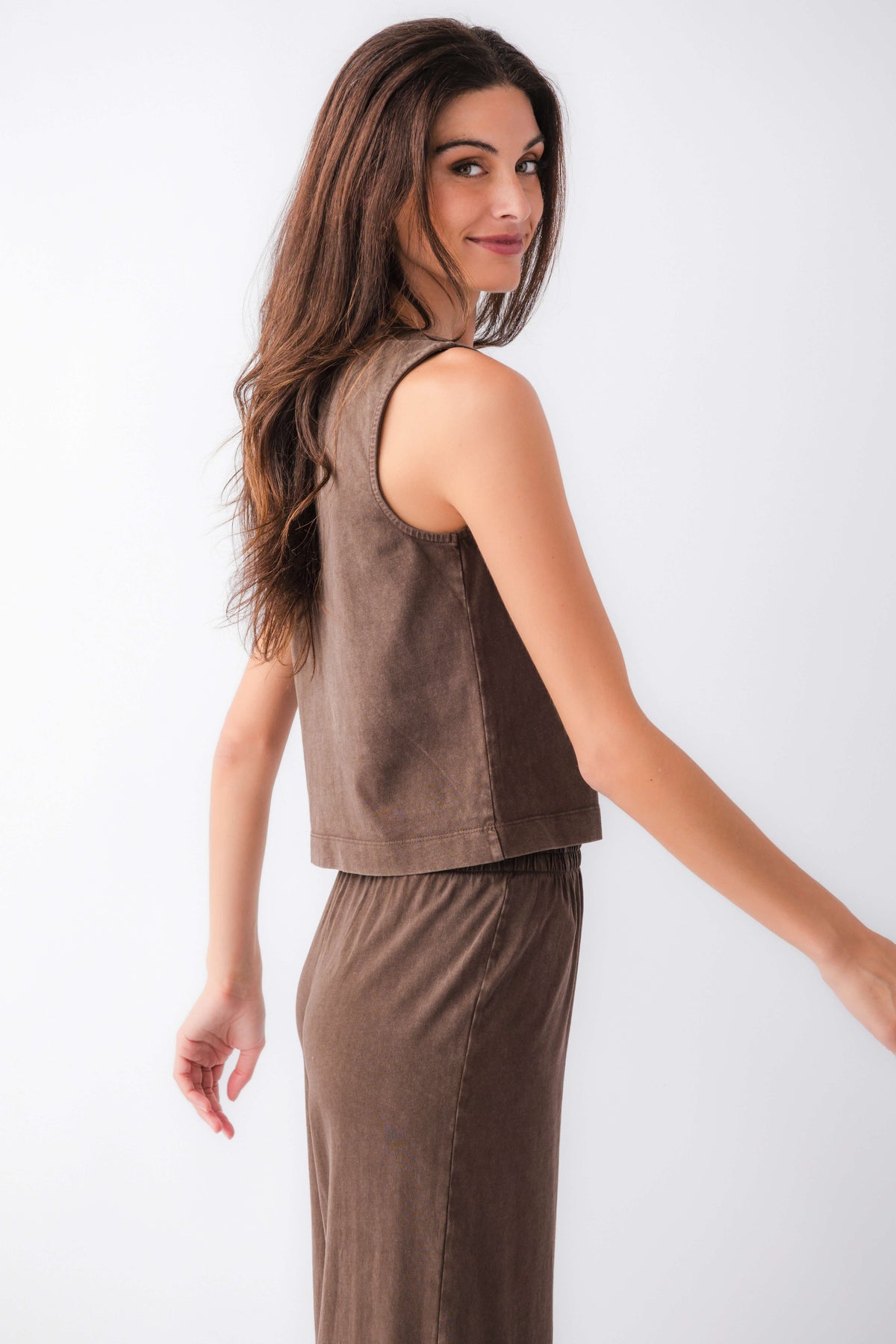 Dark brown jersey muscle tank with open back and sleeveless sides