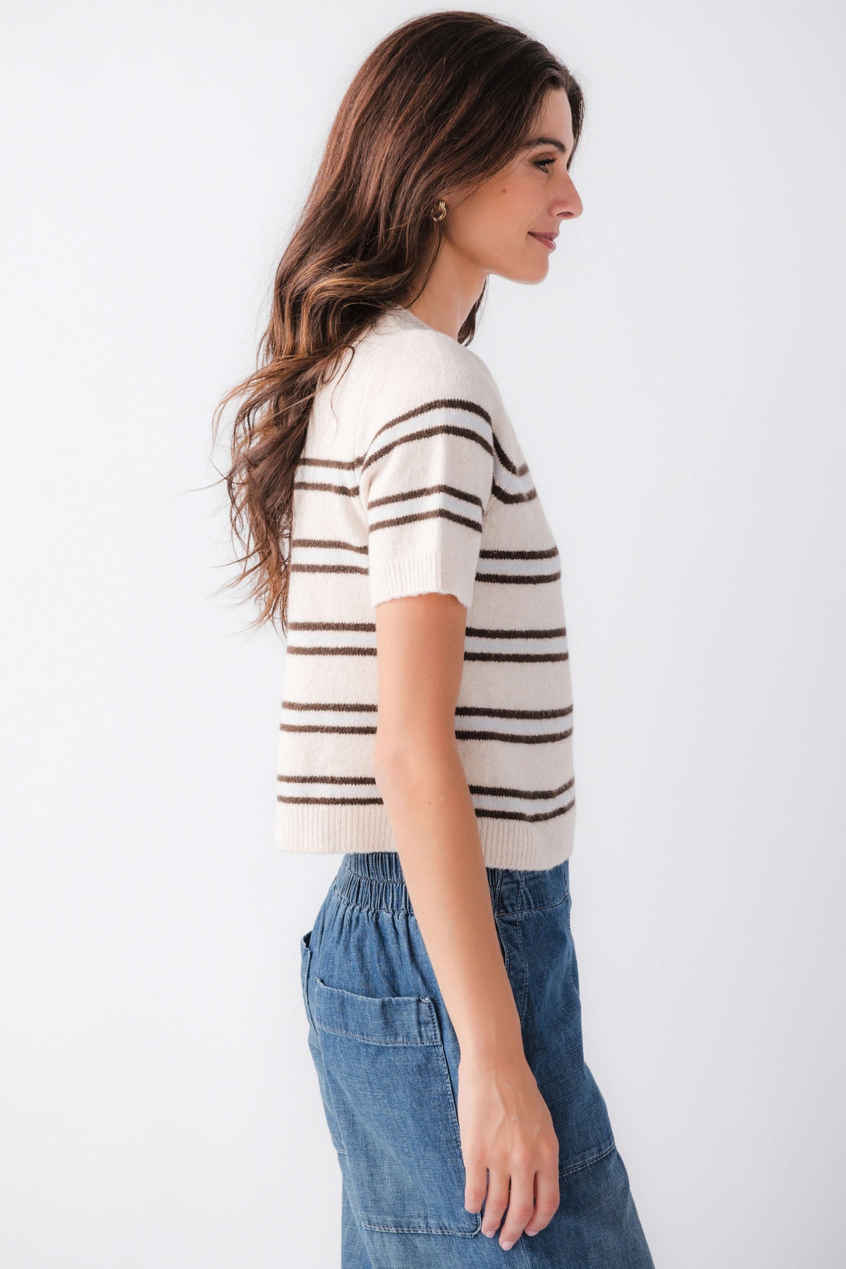 Light oatmeal heather striped knit sweater with short sleeves, side view