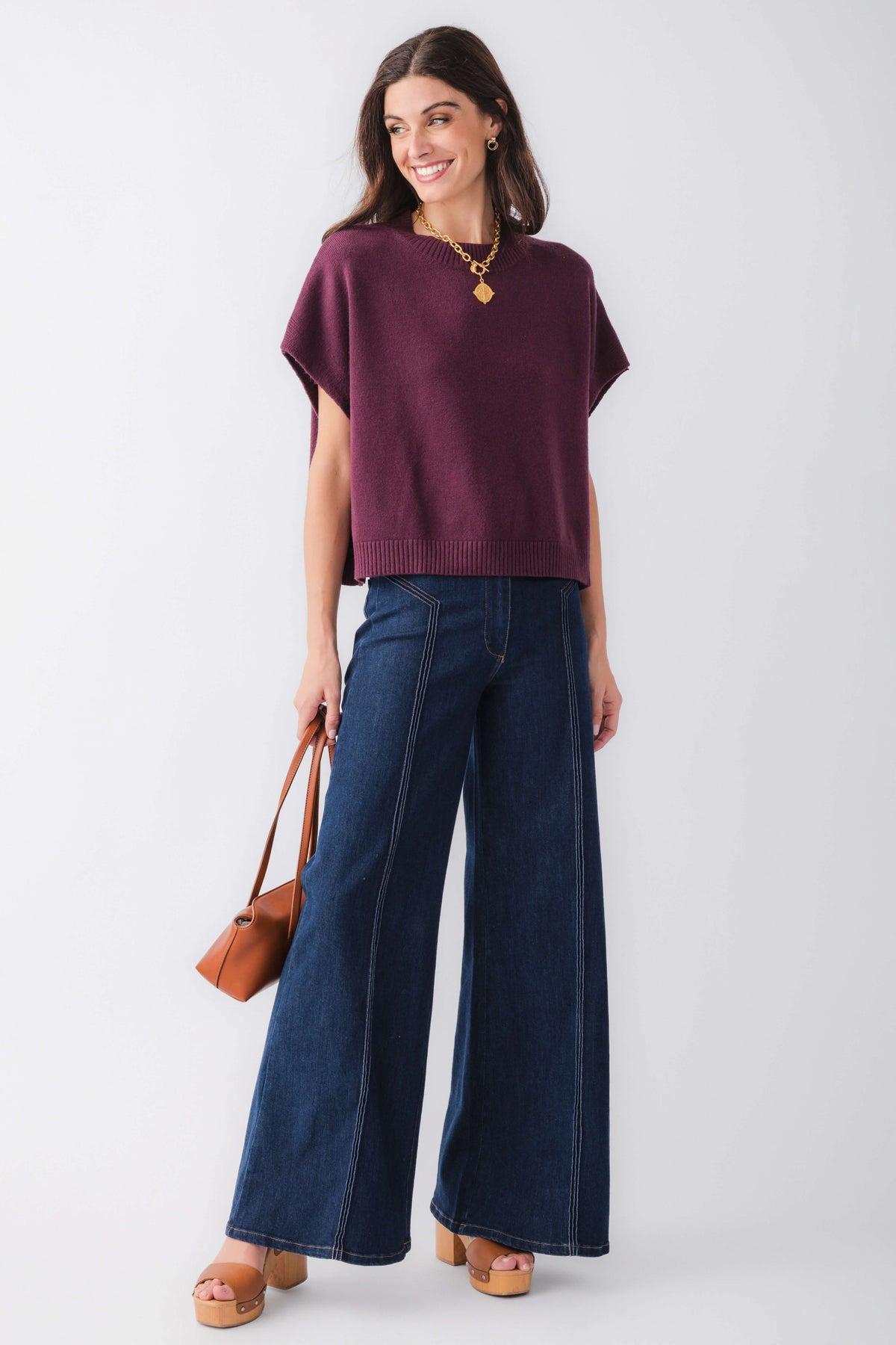 Burgundy dropped-shoulder knit top with short sleeves and ribbed crew neckline