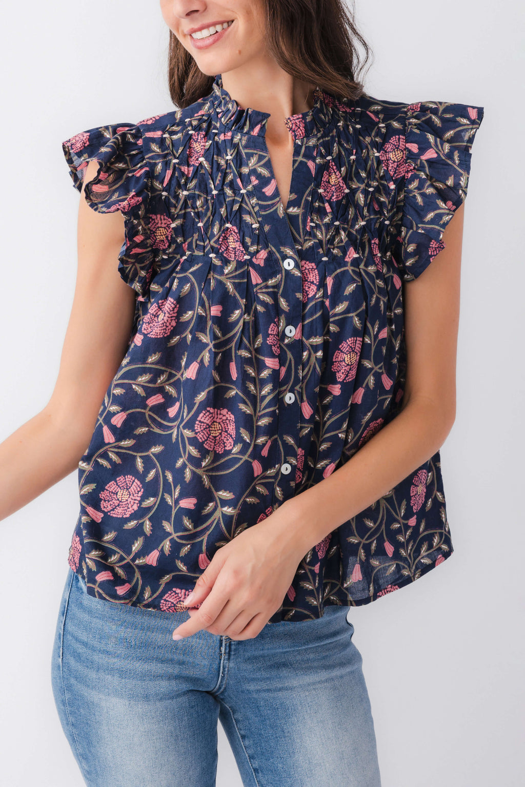 Navy floral button-up top with tiered ruffle flutter sleeves