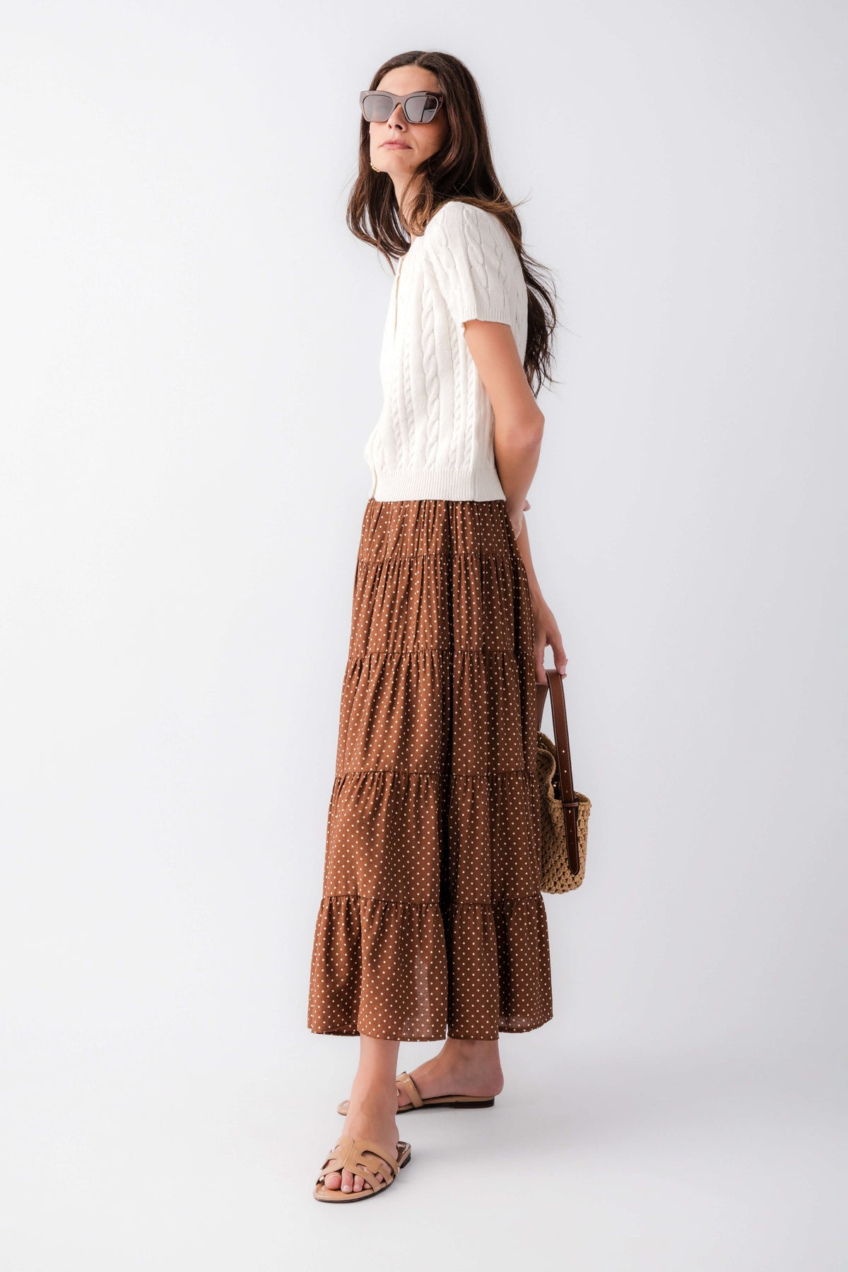 Brown polka-dot tiered maxi skirt with gathered tiered layers and elastic waist