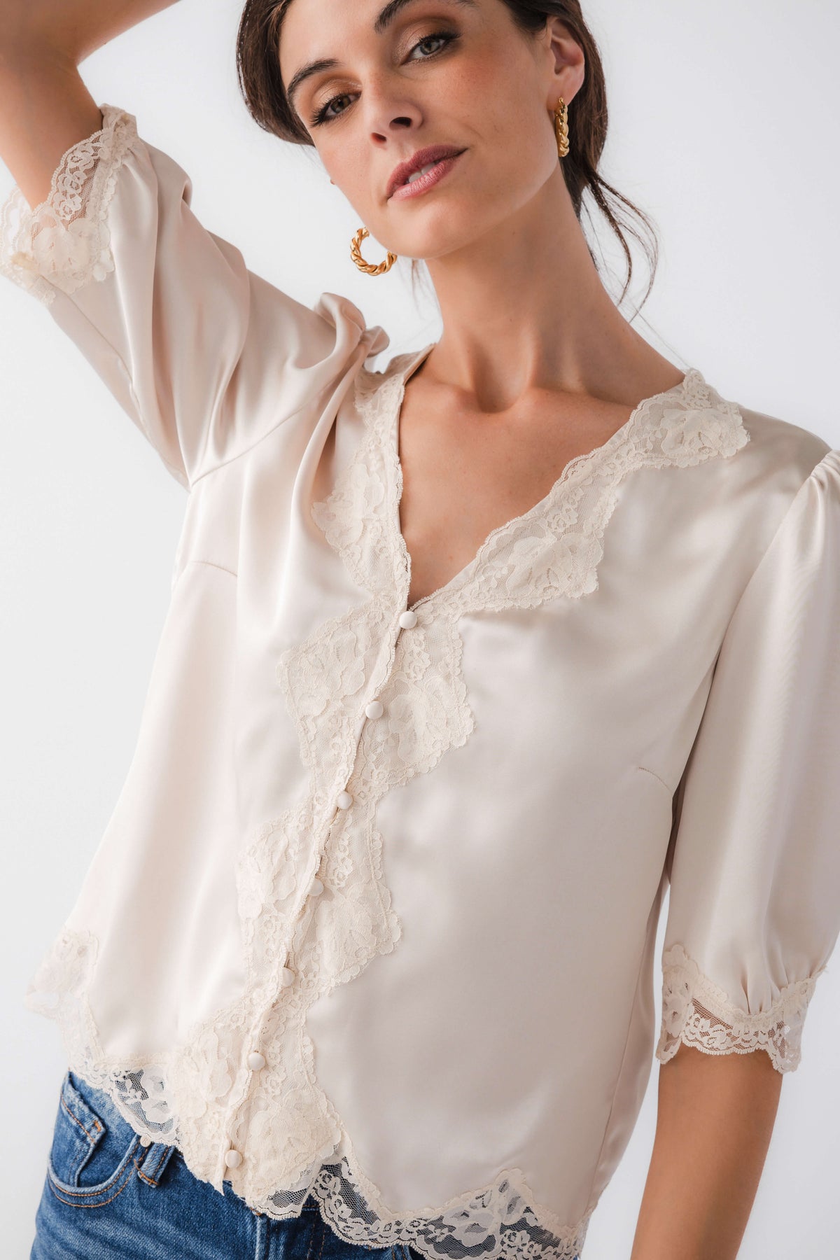 Ecru satin lace-trim blouse with V-neck lace placket and button-front detail
