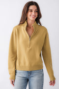 Women's gold half-zip turtleneck sweater with ribbed cuffs and hem