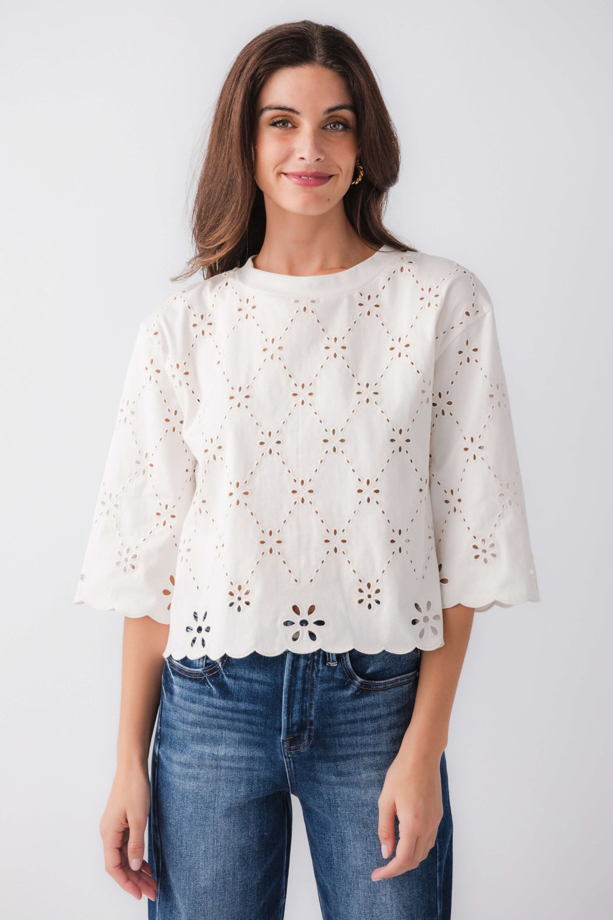 Ivory eyelet scallop top with cutout embroidery and scalloped hem, elbow-length sleeves