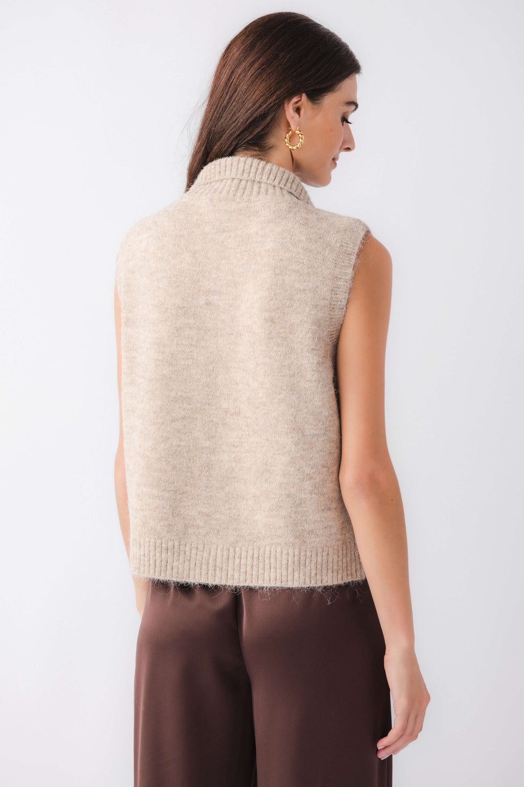 Back view of taupe sleeveless knit sweater vest with ribbed hem