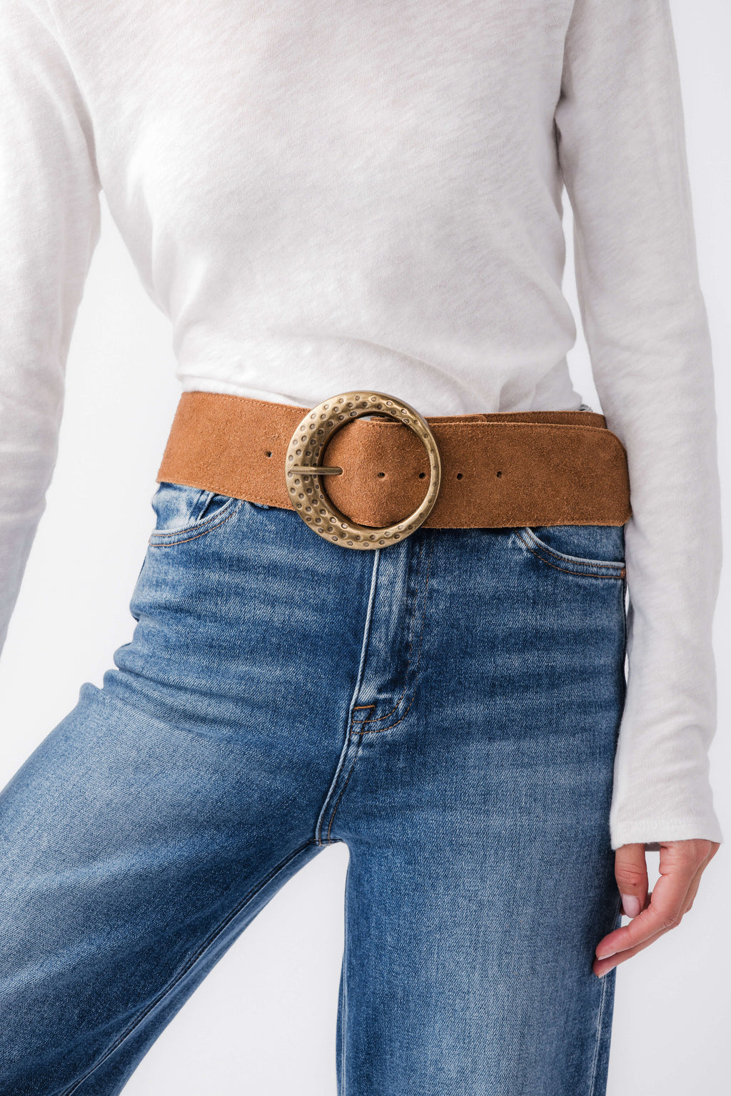 Cognac leather hip belt with round engraved buckle and adjustable holes