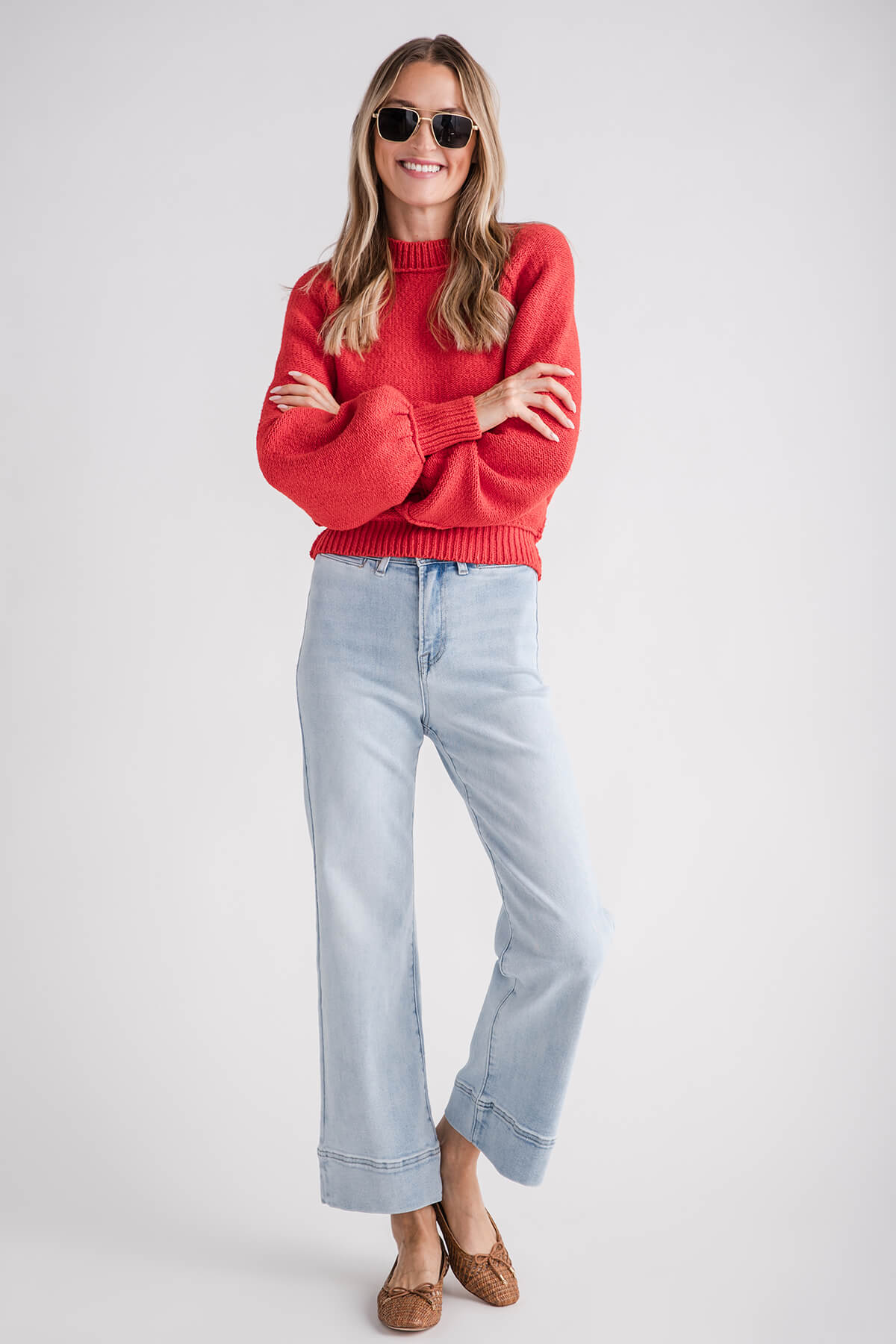 Light-wash wide-leg ankle jeans with classic five-pocket styling and cuffed hem