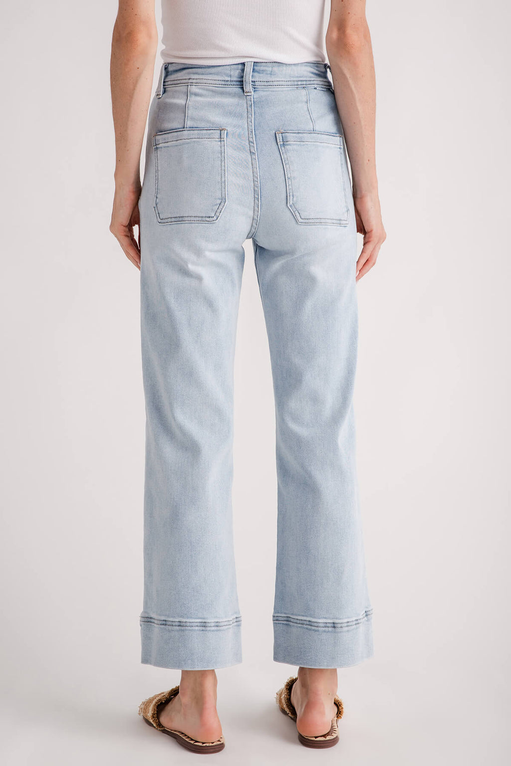 Light-wash wide-leg ankle jeans back view with two rear pockets and belt loops
