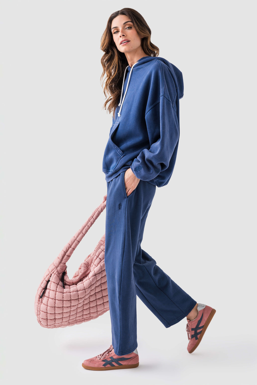 Blue wide-leg pants with elastic waist and drawstring; ankle-length hem