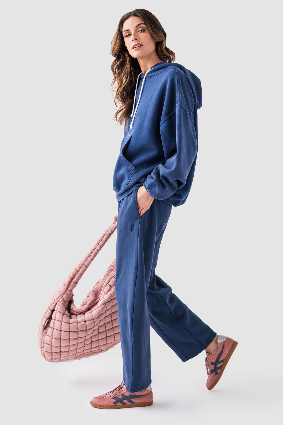 Blue wide-leg pants with elastic waist and drawstring; ankle-length hem