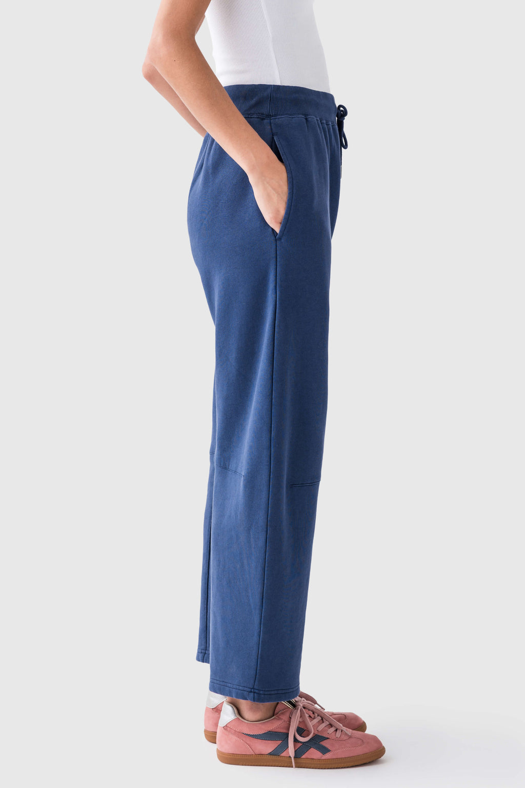 Blue wide-leg drawstring pants with elastic waist and side pockets