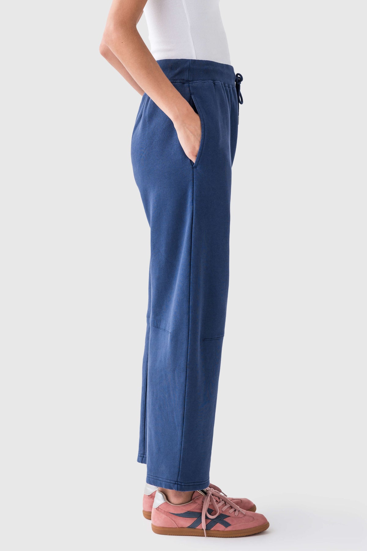 Blue wide-leg drawstring pants with elastic waist and side pockets