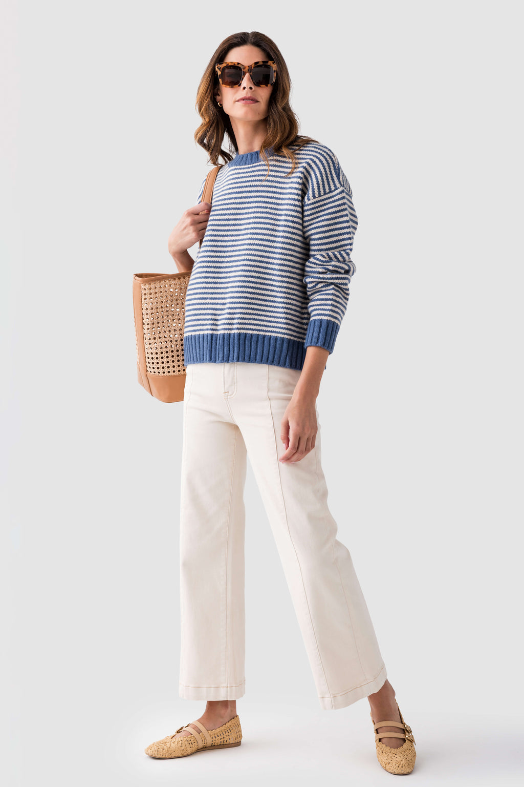 Ivory high-rise wide-leg ankle jeans with stitched front pockets and belt loops