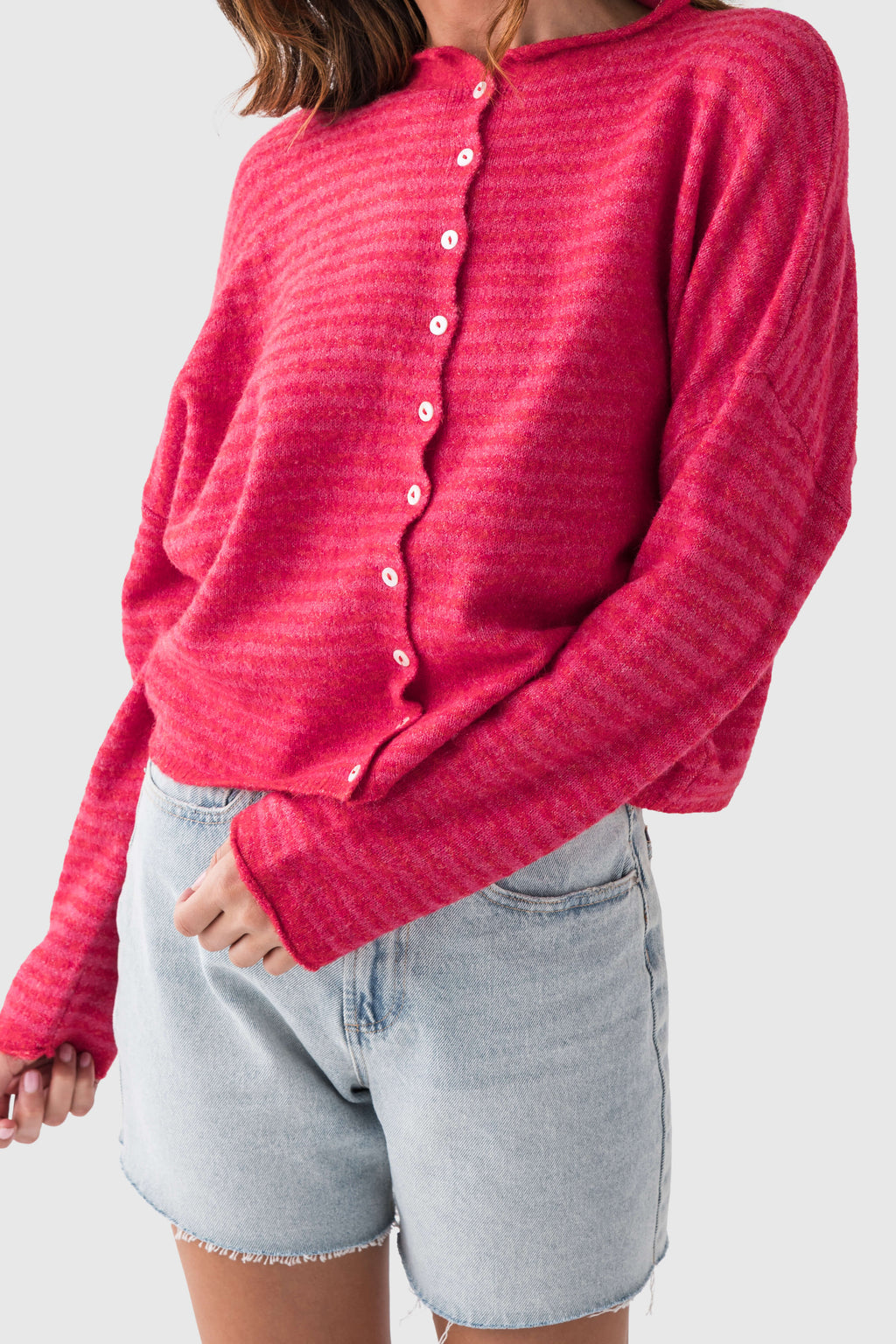 Cherry red striped cardigan with front button placket and long sleeves