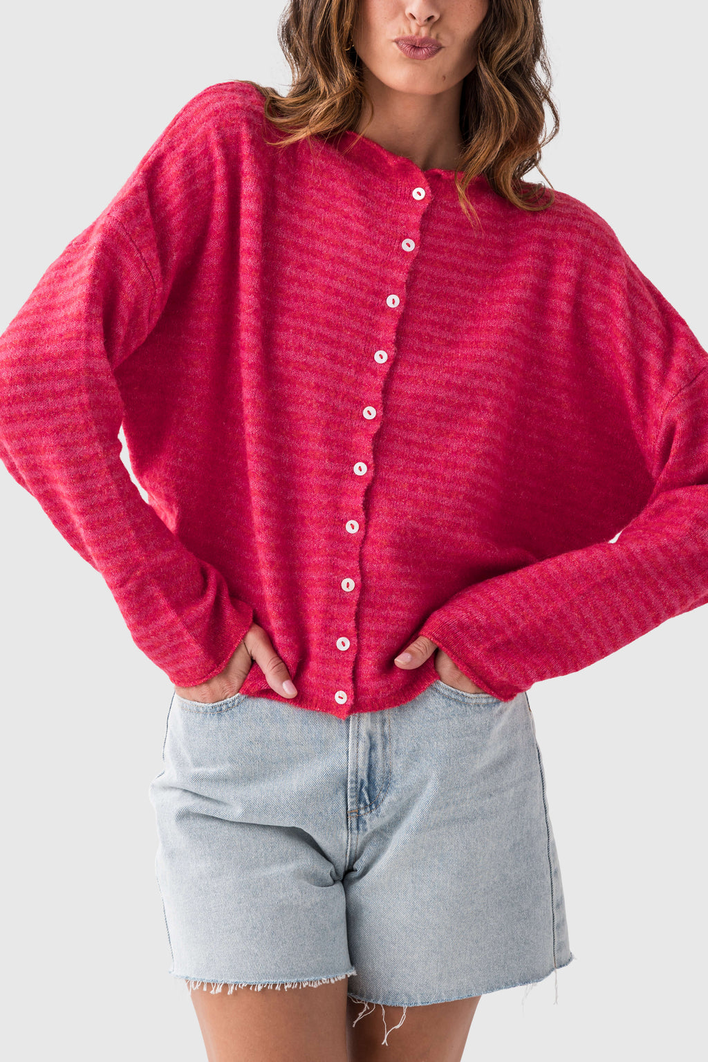 Cherry red oversized striped cardigan with button front and long sleeves