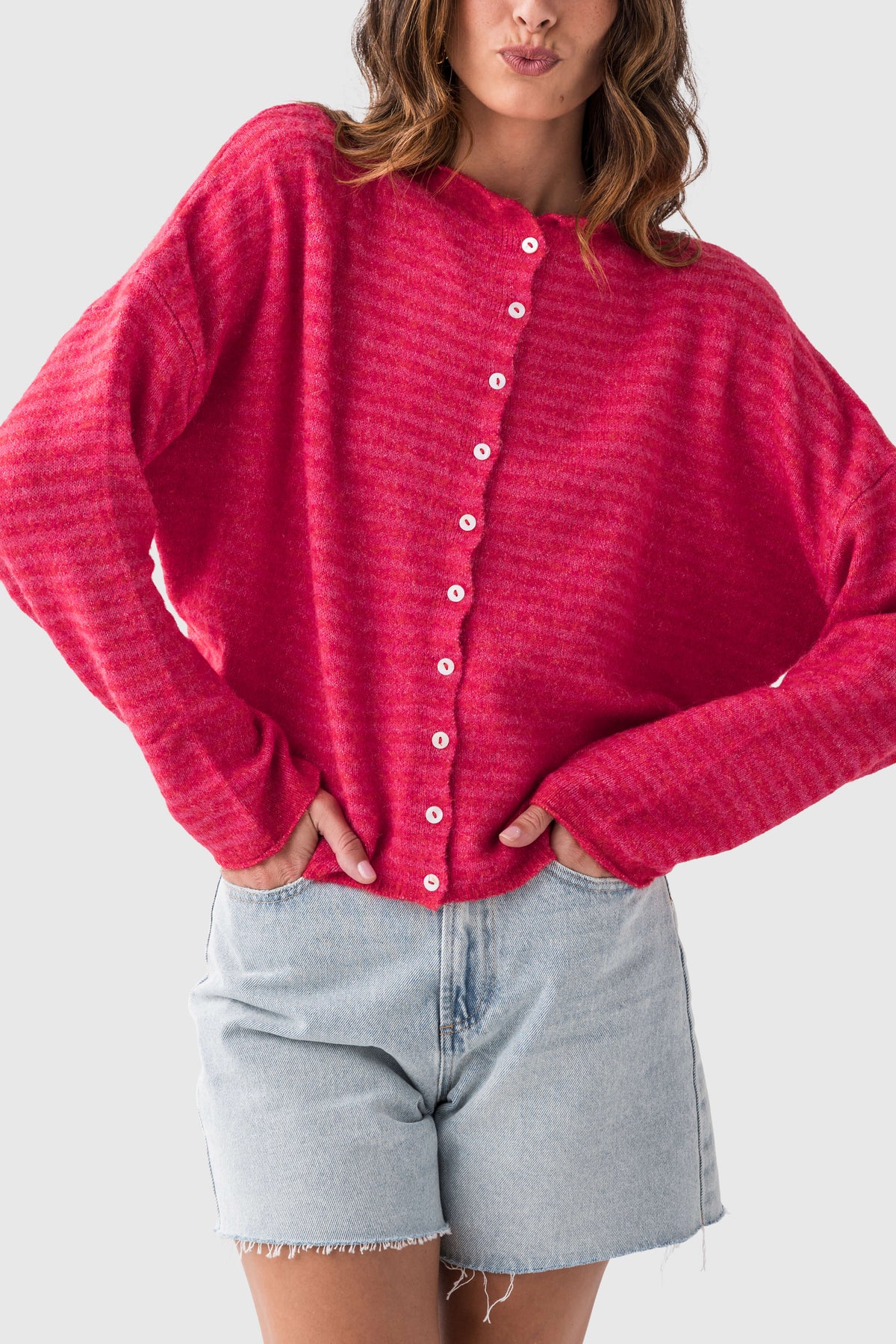 Cherry red oversized striped cardigan with button front and long sleeves