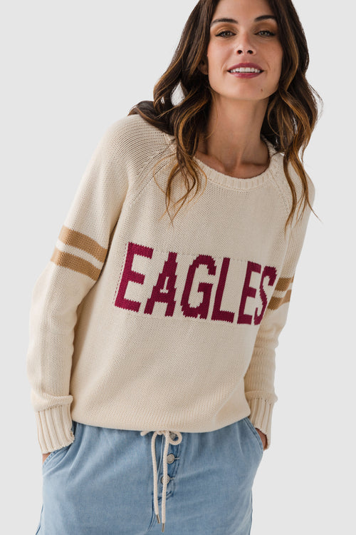 Cream knit sweater with maroon "EAGLES" logo and ribbed cuffs