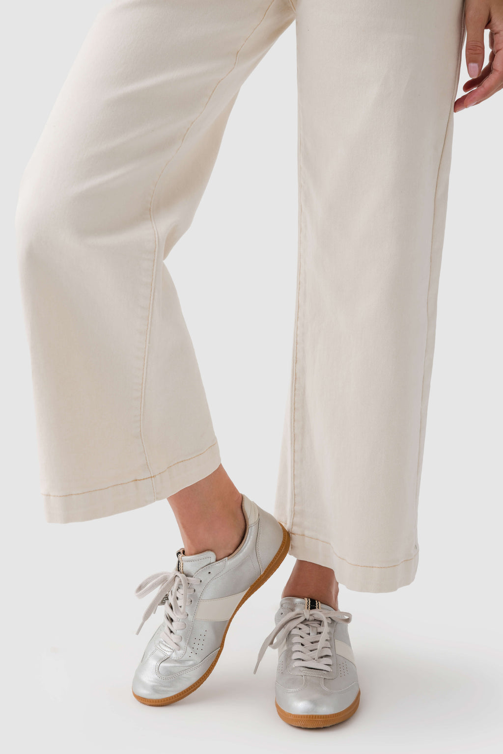 Shu Shop Sydney sneaker front with white laces and tan sole, light upper