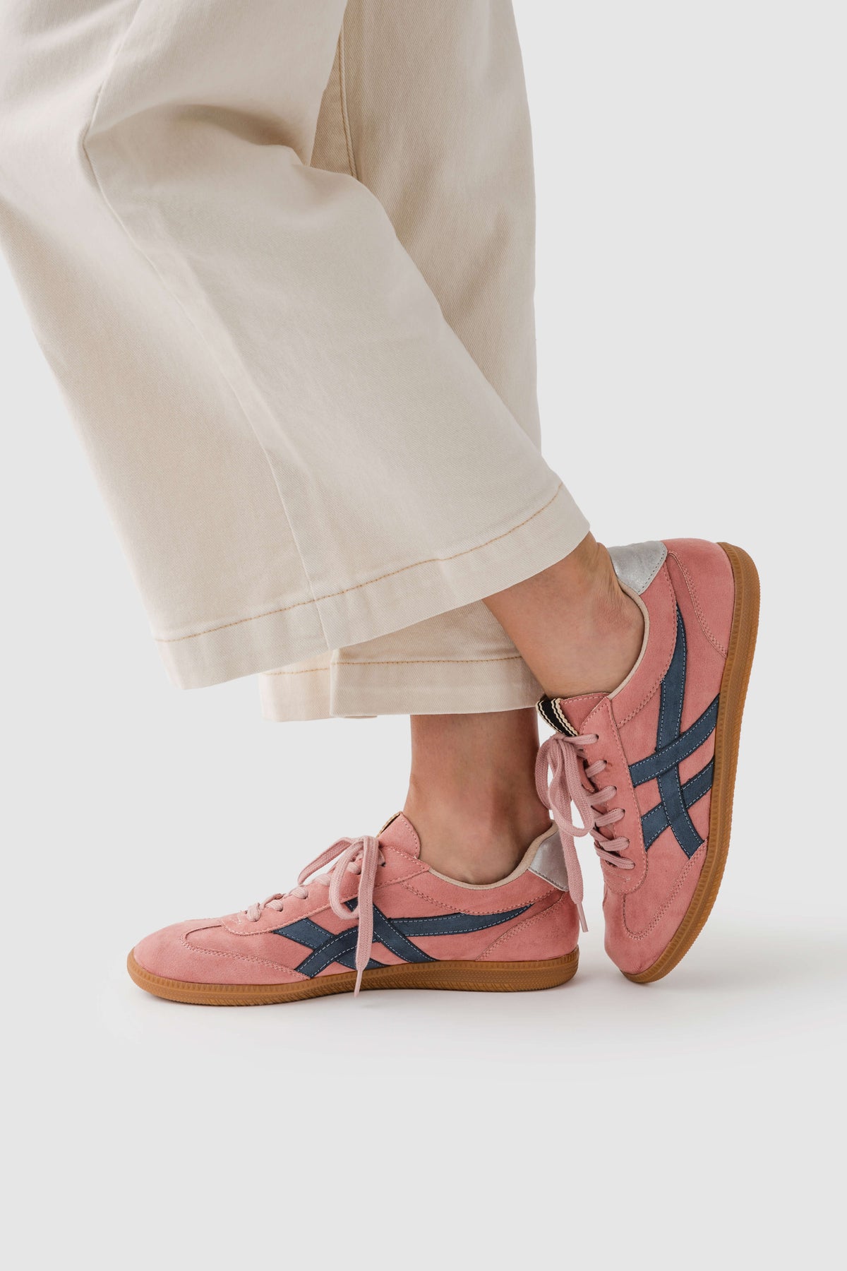 Rose suede lace-up sneaker with blue side stripes and tan gum sole