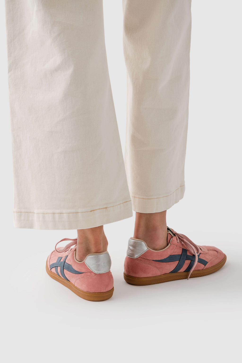 Rose suede lace-up sneakers with side stripes and low-profile gum soles