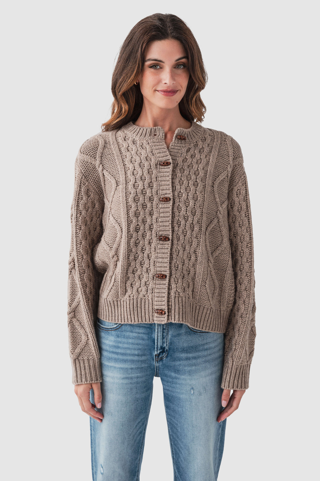 Taupe cable-knit sweater with button-front placket and ribbed cuffs