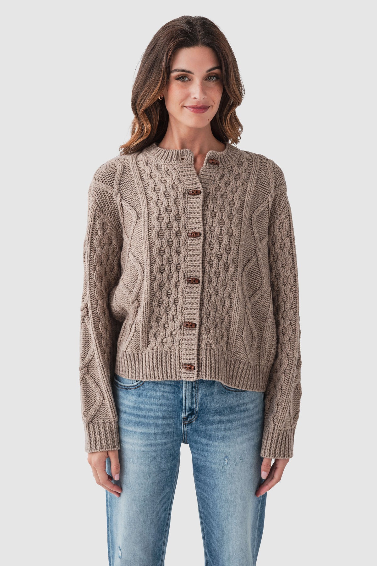 Taupe cable-knit sweater with button-front placket and ribbed cuffs