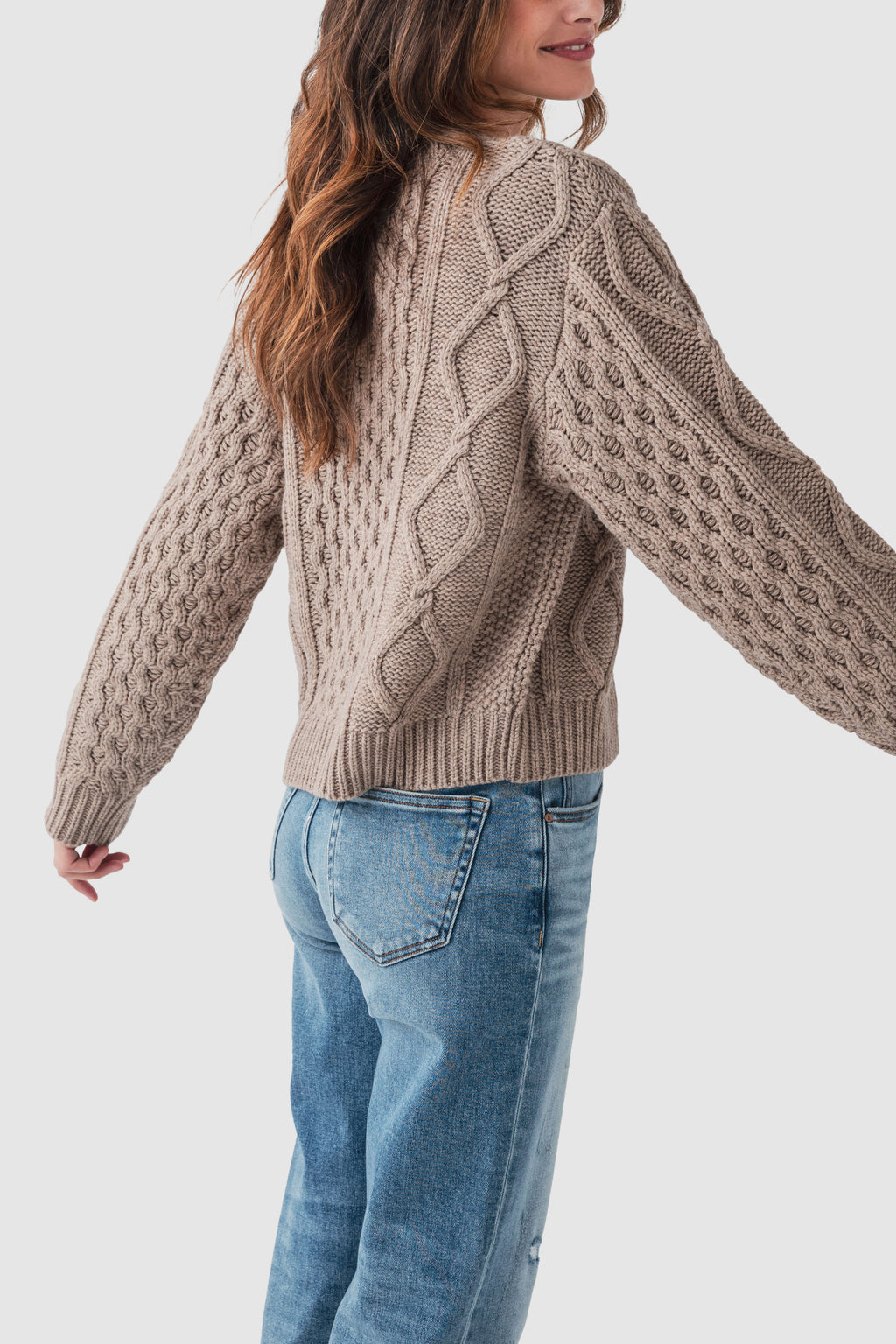 Taupe cable-knit sweater with crew neck and button-front detail, long sleeves