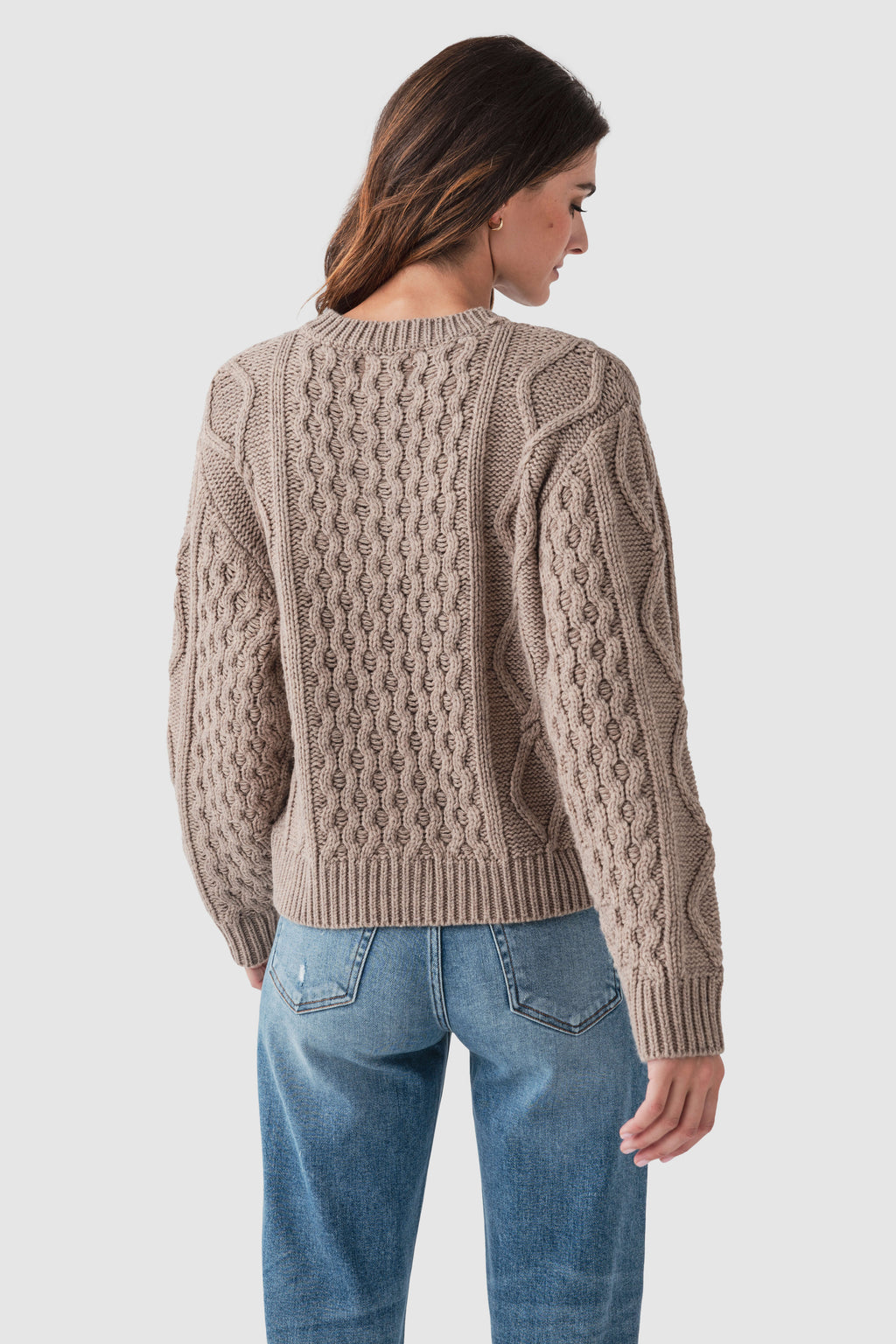 Taupe cable-knit sweater back view with vertical cable and ribbed hem