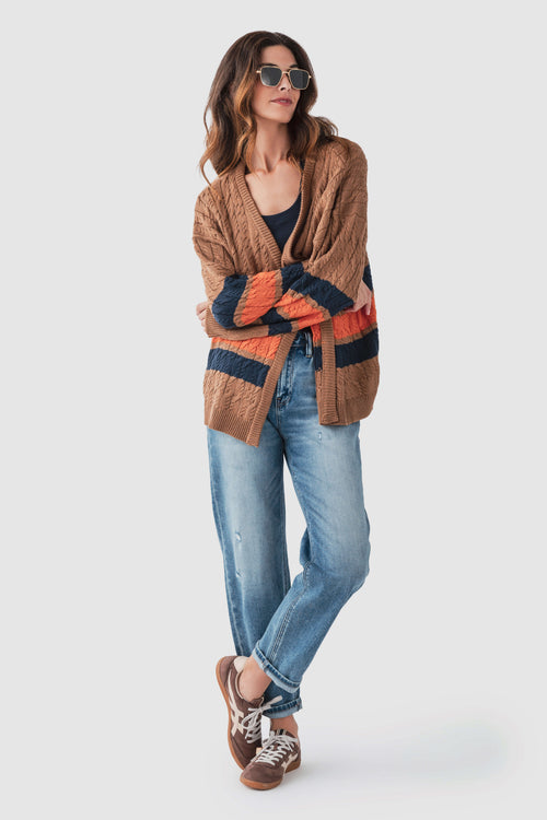 Brown open-front cable-knit cardigan with varsity stripe bands in navy and orange