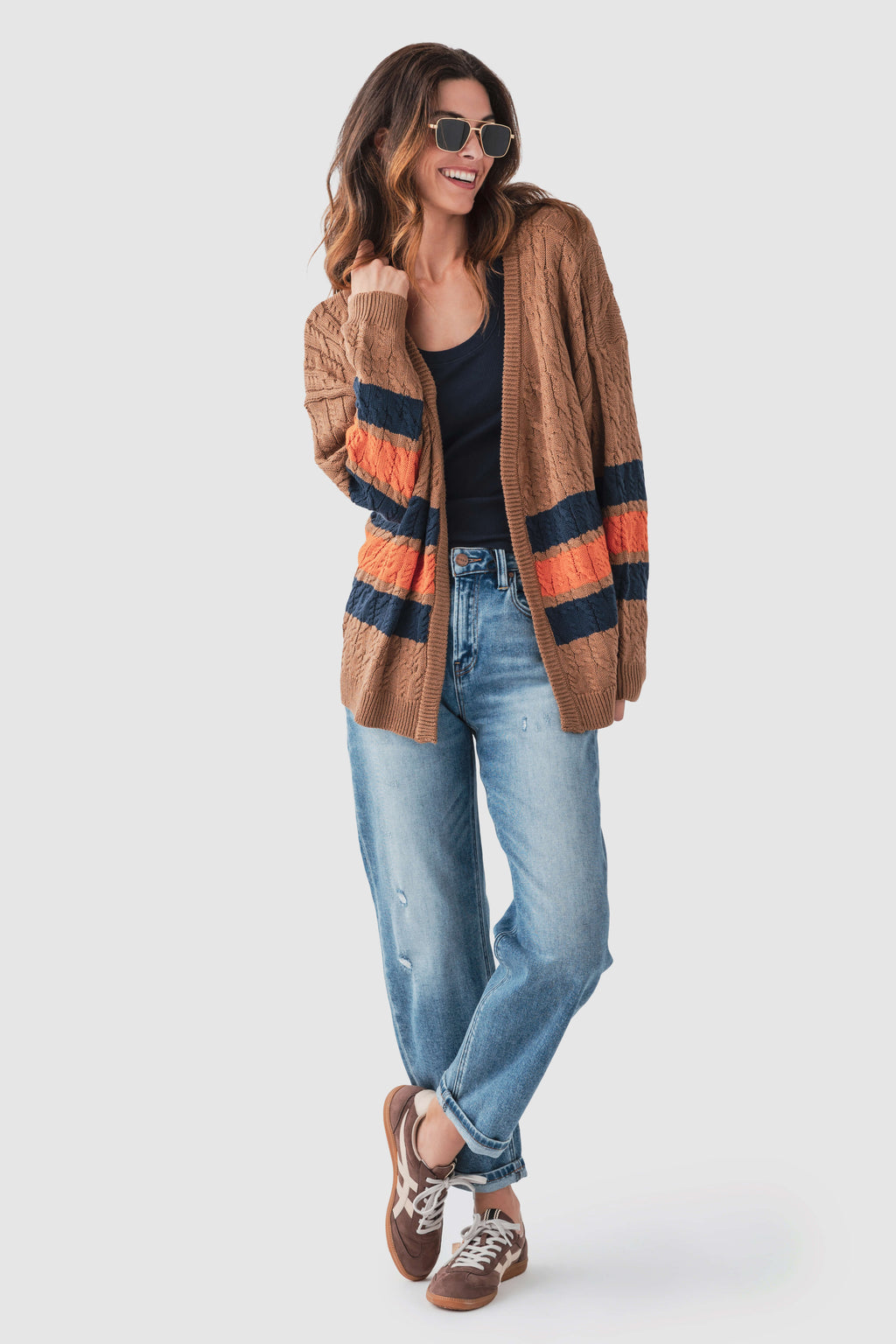 Brown varsity stripe cardigan, cable-knit with open front and navy/orange band details