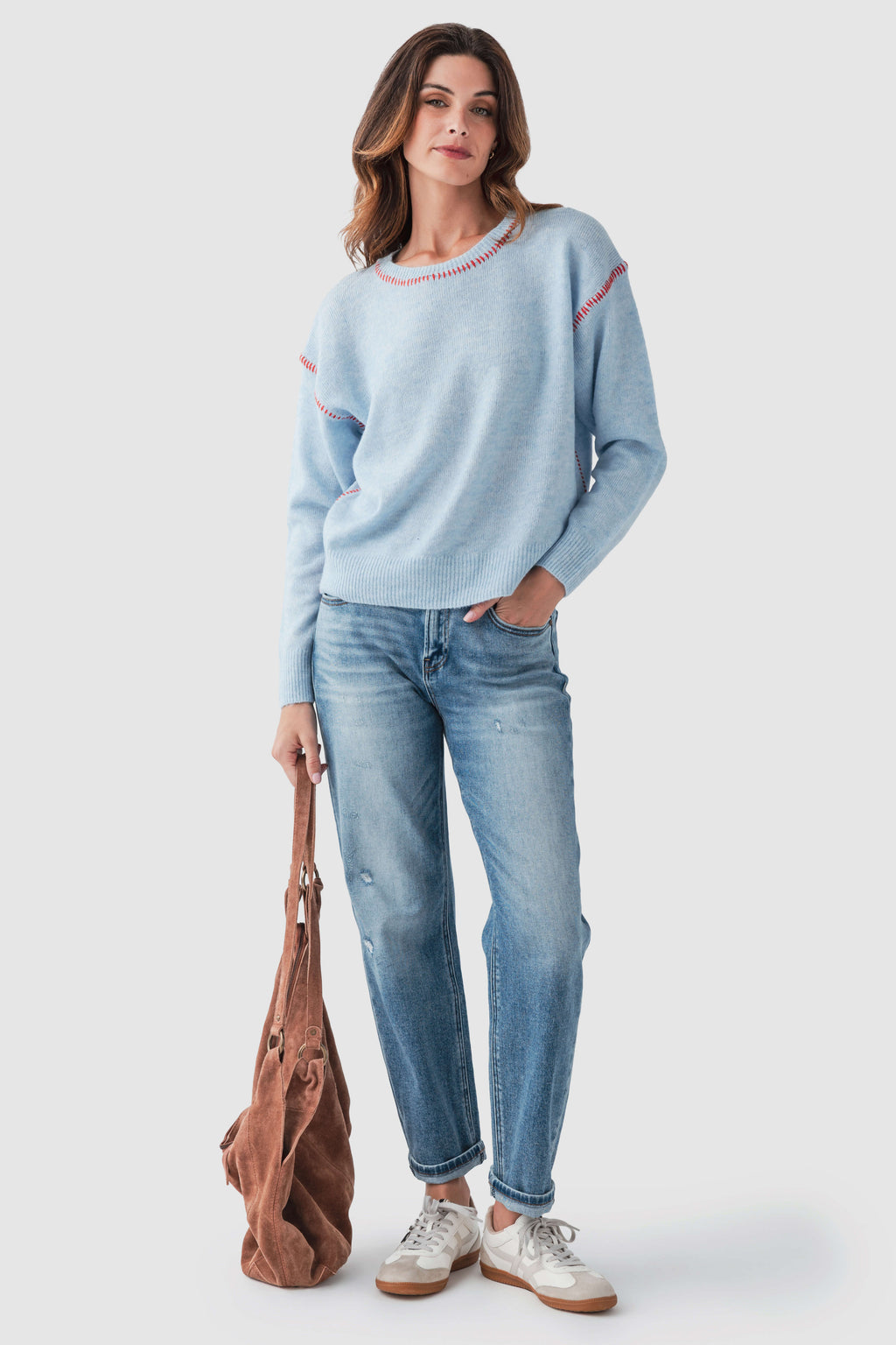 Light blue crewneck sweater with red contrast stitch, ribbed cuffs and hem