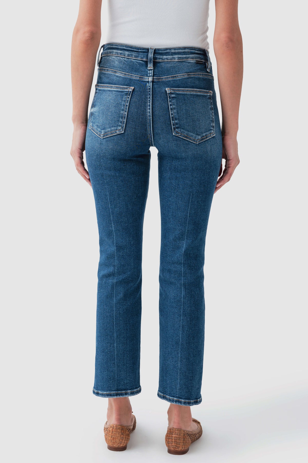High-rise straight crop jeans back view in dark blue wash with straight-leg cut