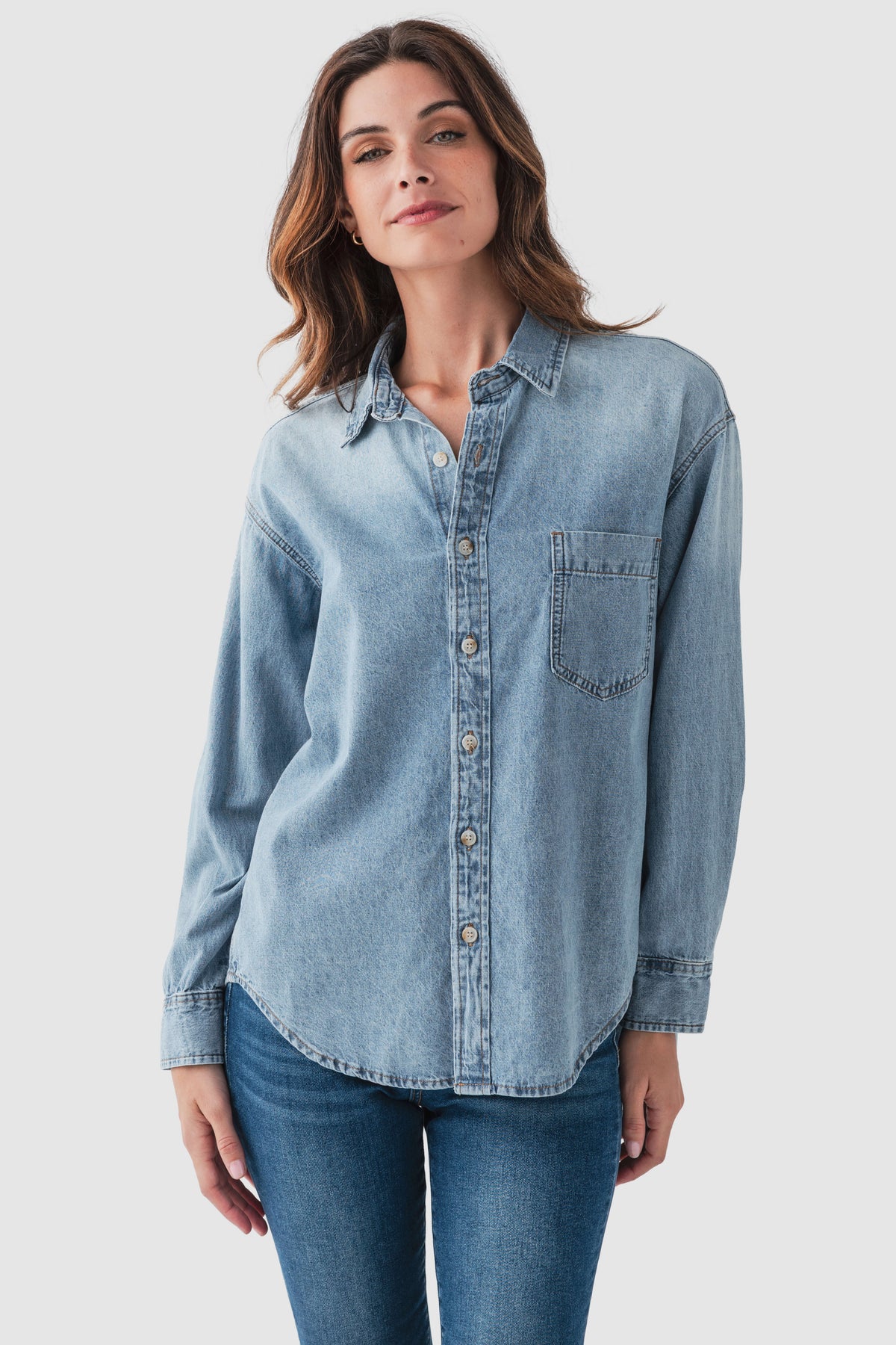 Blue denim button-up top with chest pocket and button front
