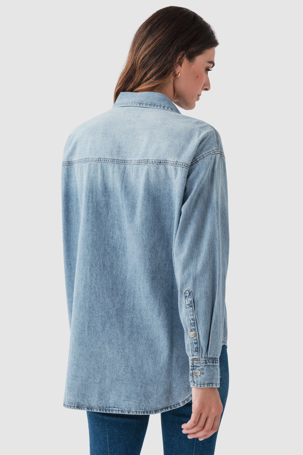 Blue denim button-up top, back view with button placket and button cuffs