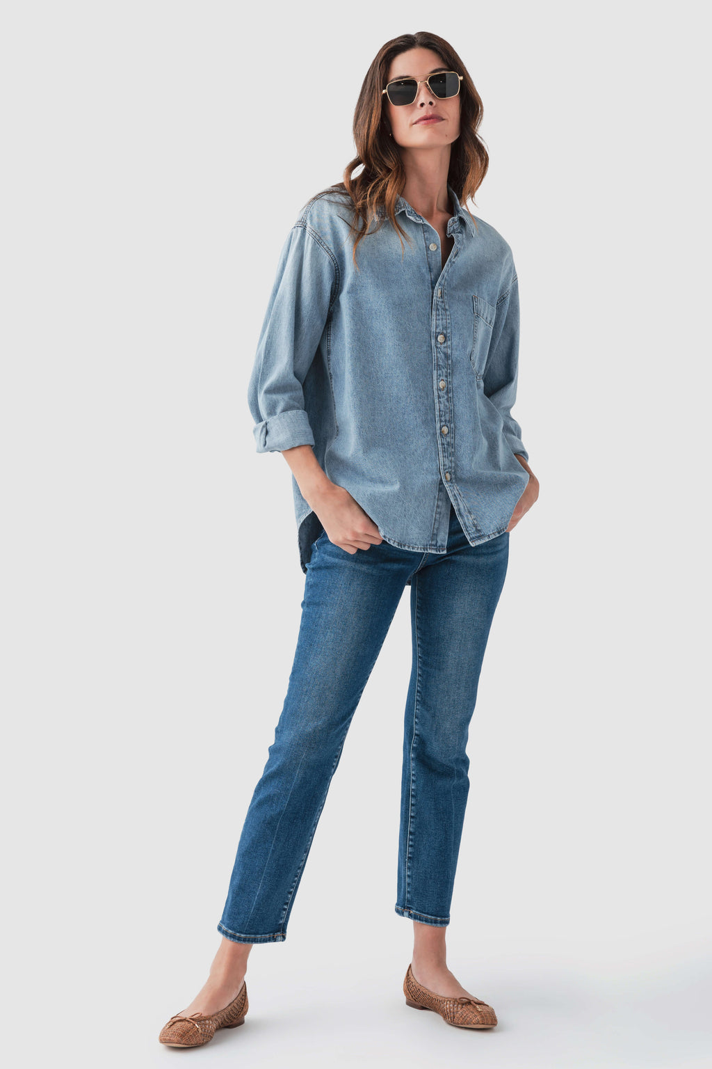 Blue denim button-up top with button front and long sleeves