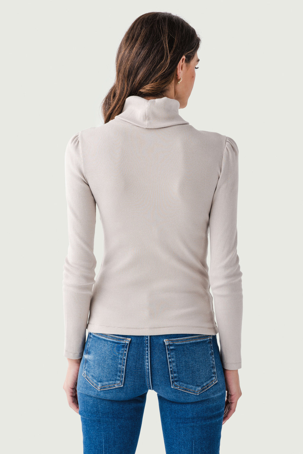 Light cream long-sleeve turtleneck top, back view