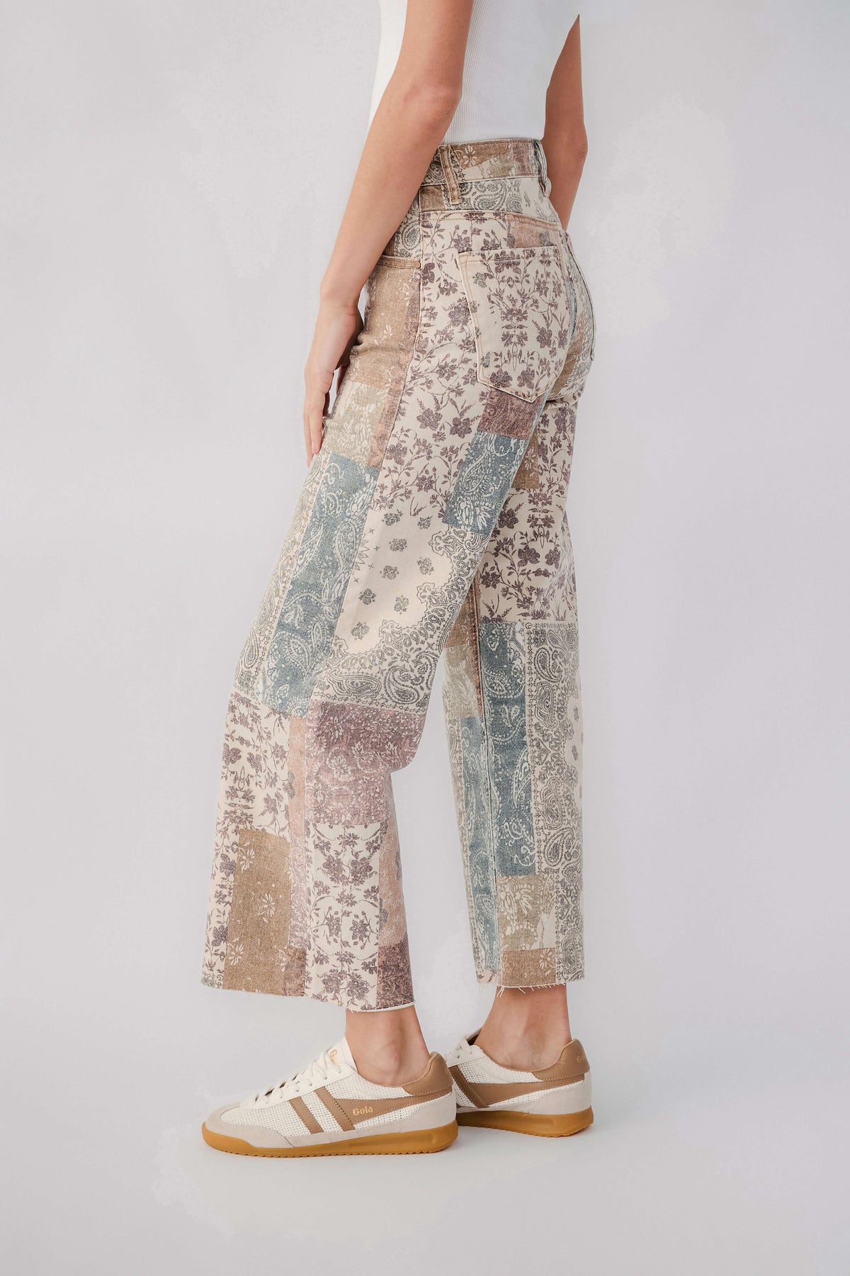 High-rise wide-leg patchwork paisley pants with earth-tone panel detail