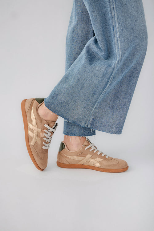 Mink suede low-top sneaker, side view with white laces and gum outsole