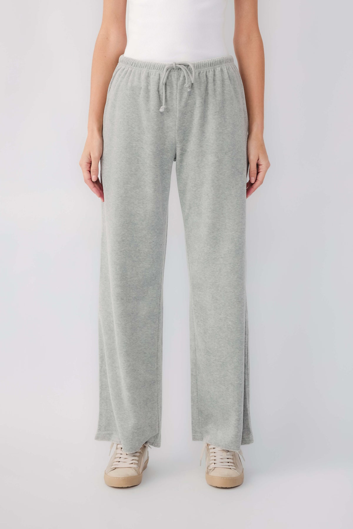 Grey velour wide-leg pants with elastic drawstring waist and relaxed fit