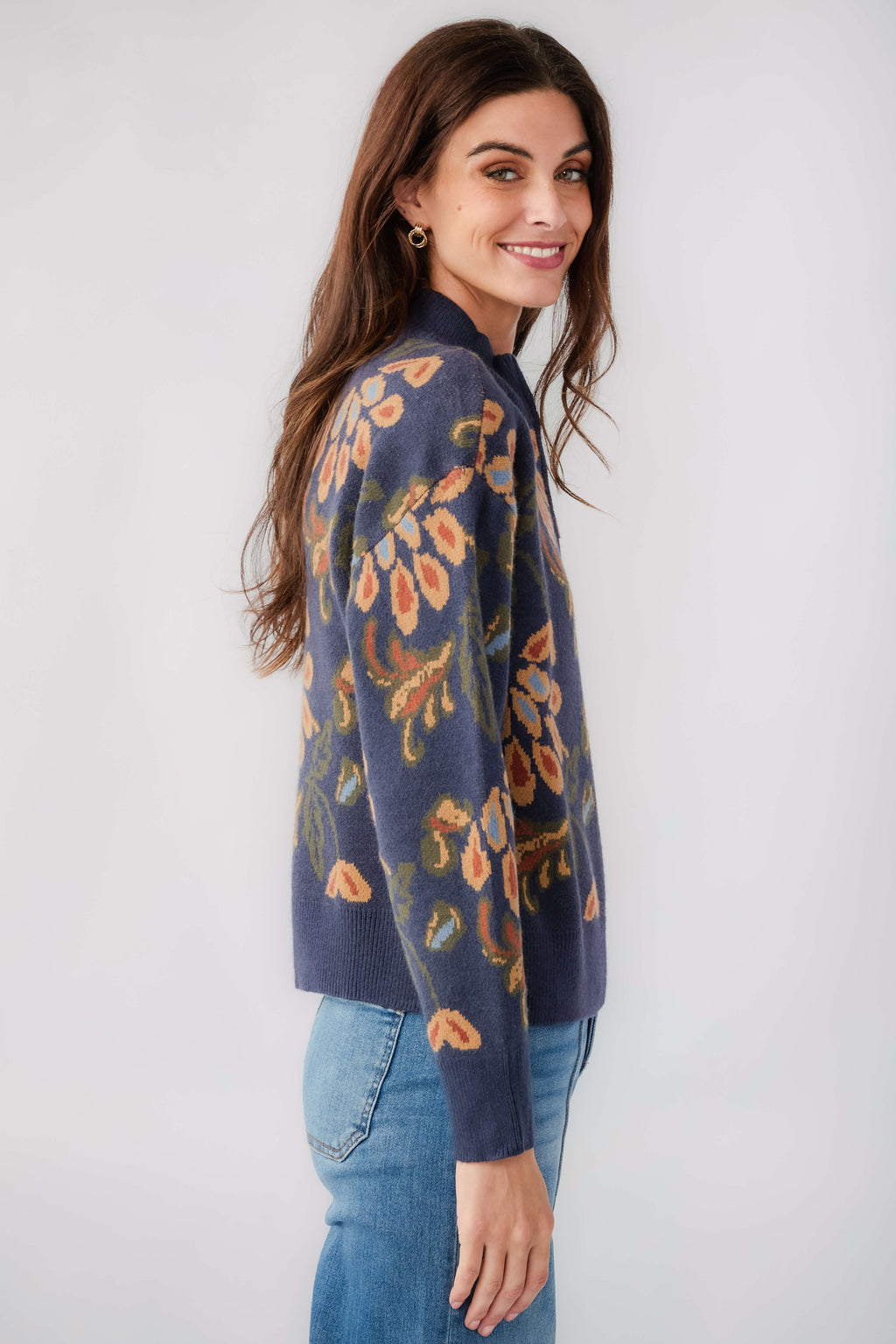 Dark denim floral print 1/4 zip sweater with long sleeves and patterned shoulders