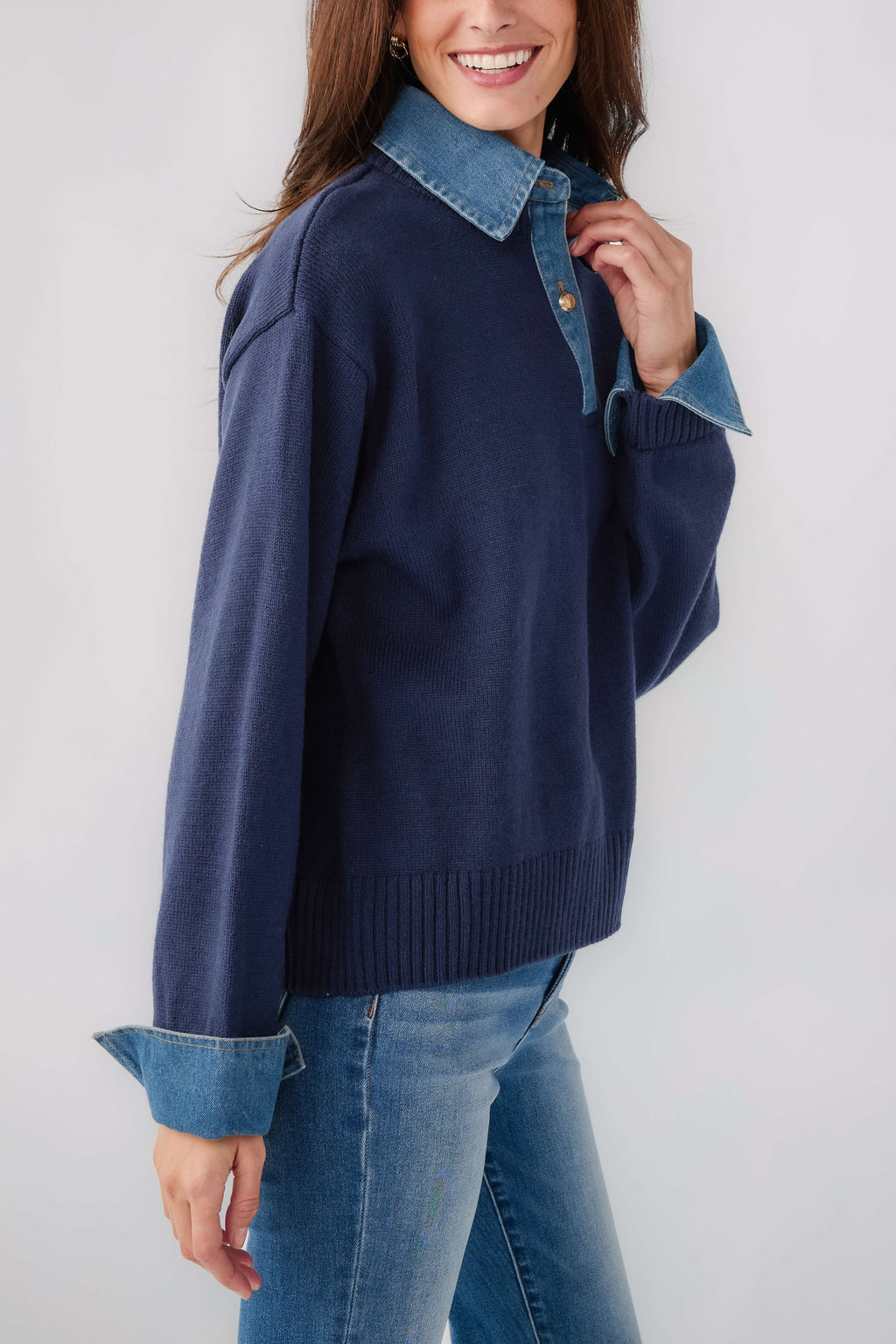 Navy denim polo sweater with contrast chambray collar and ribbed hem