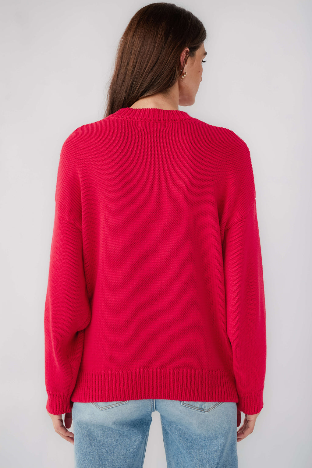Red crewneck sweater back view with ribbed hem and cuffs