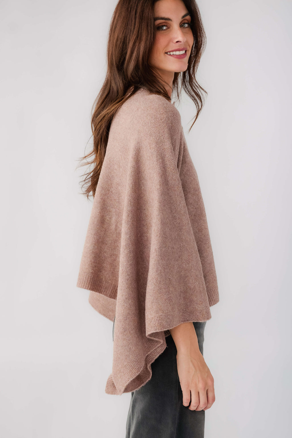Mushroom poncho sweater with asymmetrical hem and draped sleeves