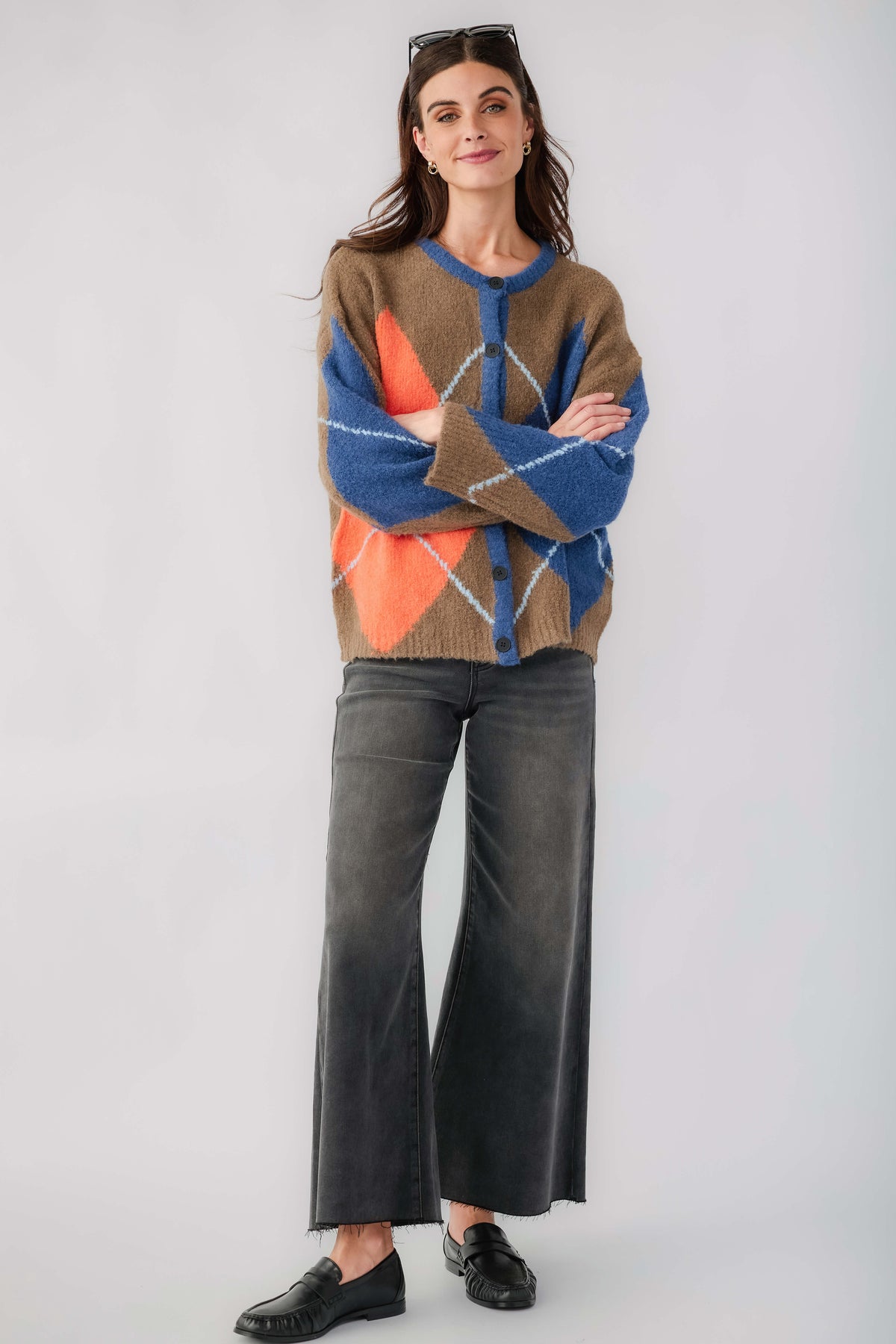 Dark washed wide-leg denim jeans with raw hem and slant front pockets